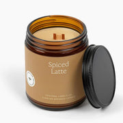 Spiced Latte candle in an amber jar with a black lid on a white background