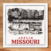 Illustration of a waterfall with 'Joplin Missouri' text on a wooden surface