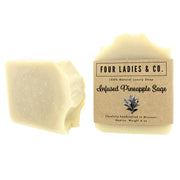 Bar of soap with 'Four Ladies & Co.' packaging on a white background