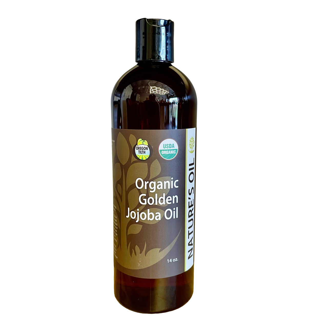 Bottle of Organic Golden Jojoba Oil with label on a white background
