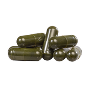 Green capsules on a white background
