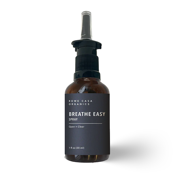 Brown spray bottle labeled 'All-Natural Sinus Decongestant Spray' on a white background