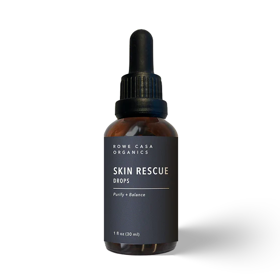 rowe casa Bottle of 'Skin Rescue Drops' with a dropper on a white background