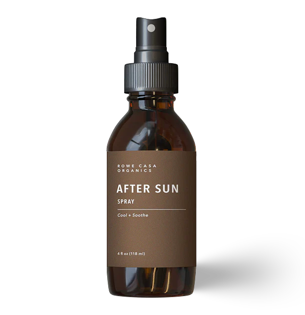 Brown spray bottle with black nozzle labeled 'All Natural Cooling After Sun Spray' on a white background