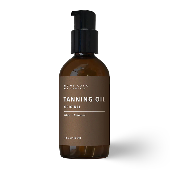 Brown bottle of all-natural protective tanning oil on a white background