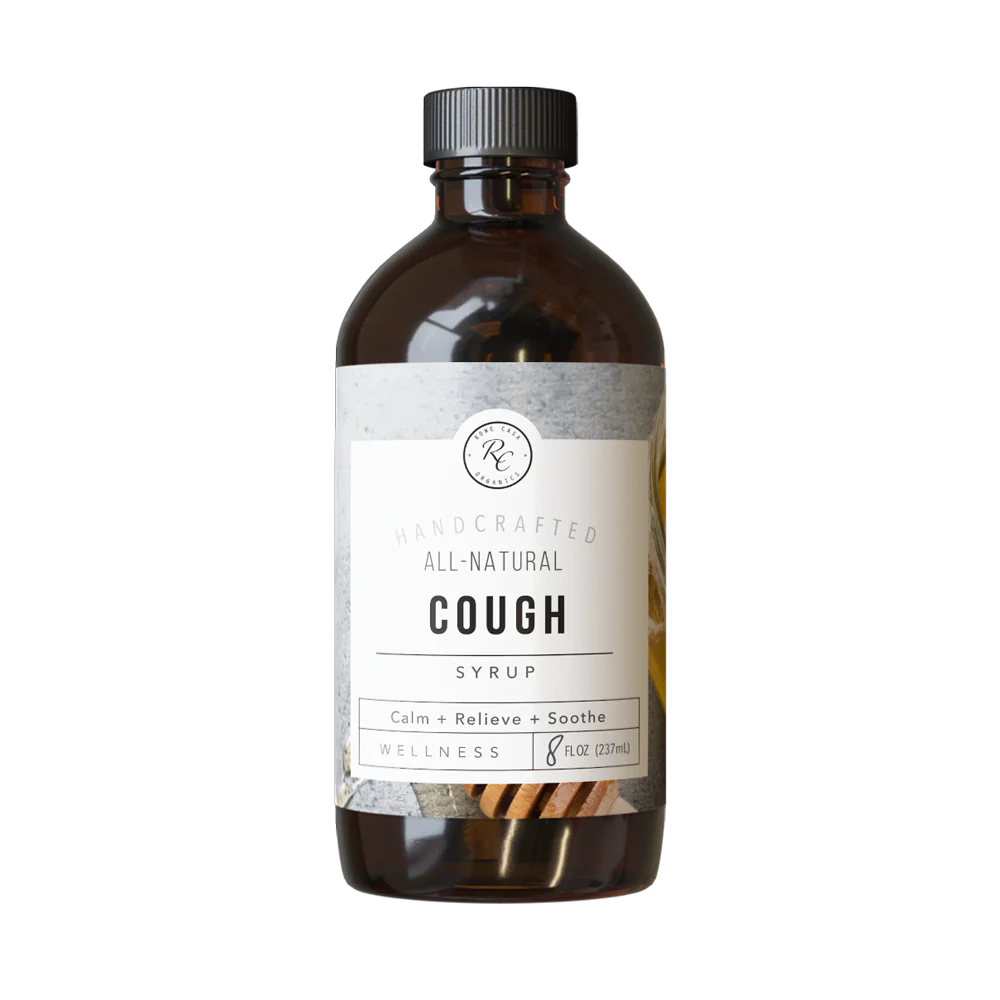 Rowe Casa Bottle of all-natural cough syrup with a label on a white background