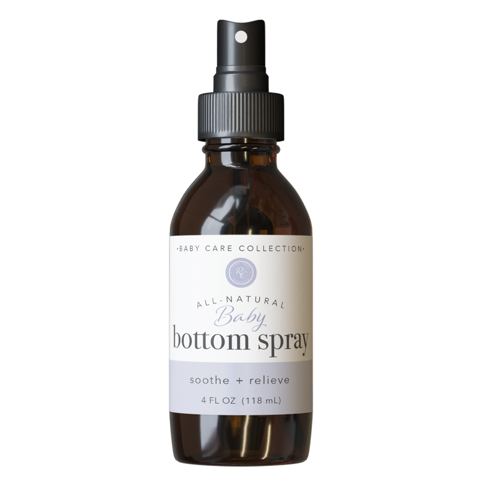 Rowe Casa Brown spray bottle labeled 'All Natural Baby Bottom Spray' on a white background