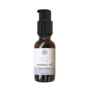 Rowe Casa Bottle of baby tummy oil with a black pump on a white background