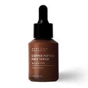 Brown bottle of Rowe Casa Organics Copper Peptide Face Serum on a white background