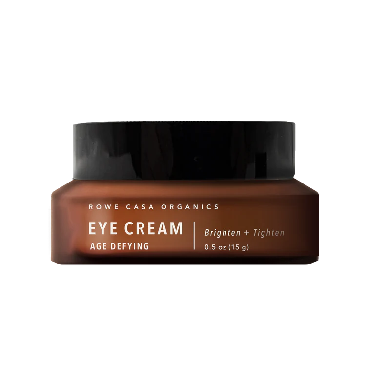 Brown jar of Rowe Casa eye cream with black lid on a white background