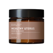 Jar of Rowe Casa Organics Healthy Uterus Essential Oil Salve on a white background