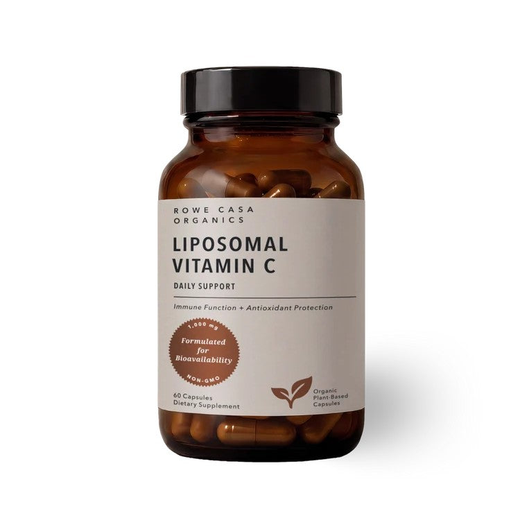 A bottle of Rowe Casa Organics Liposomal Vitamin C dietary supplement, featuring an amber glass bottle with a black cap and a beige label, shown on a white background.