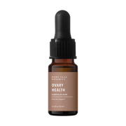 Brown glass bottle with dropper labeled 'Ovary Health' on a white background