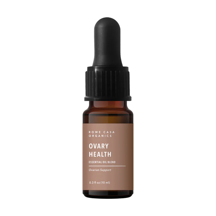 Brown glass bottle with dropper labeled 'Ovary Health' on a white background
