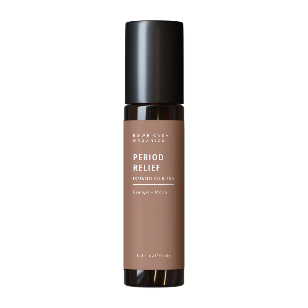 Bottle of Rowe Casa Organics Period Relief essential oil blend on a white background