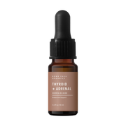 Rowe Casa Bottle of Thyroid + Adrenal essential oil blend with dropper on a white background