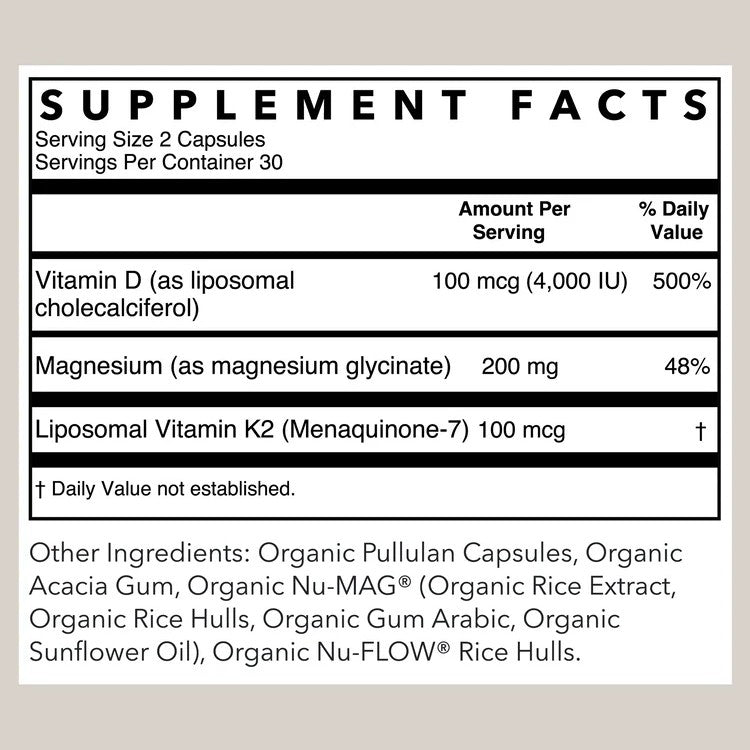 A supplement facts label showing a supplement bottle's nutrition panel, with text for Vitamin D, Magnesium, and Liposomal Vitamin K2, plus other ingredients listed below on a light gray background.