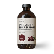 A 16 fl oz amber glass bottle of Rowe Casa Organics Tart Cherry Sleep Support liquid supplement with a black cap and cream label, shown on a white background with a soft shadow.