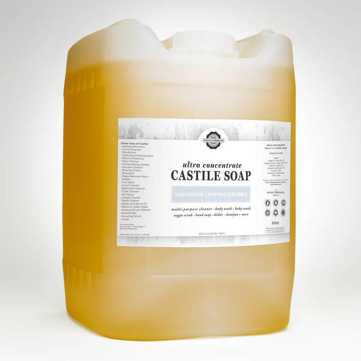 Large container of Castile soap with a label on a white background