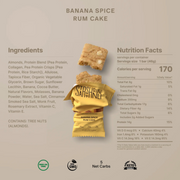 A packaged snack product labeled 'Banana Spice Rum Cake' shown on a beige background with ingredient text, nutrition facts, and a small photo of the cake pieces above a yellow wrapper.