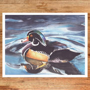 Painting of a duck floating on water with a wooden background