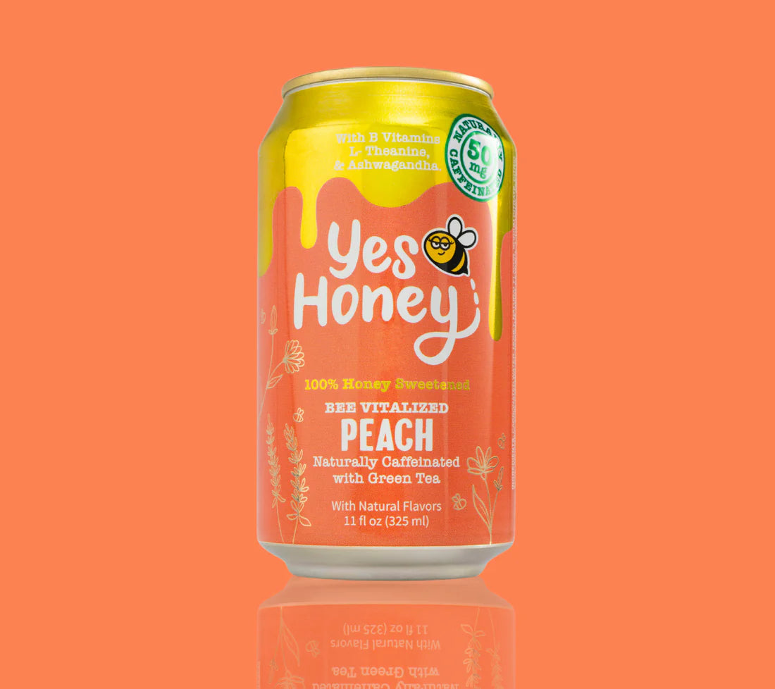 Can of 'Yes Honey' peach-flavored drink on an orange background