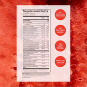 A supplement facts label card shown against a textured red background with three orange callout circles. The label reads 'Supplement Facts' and lists nutrients such as total carbohydrate, sugar, vitamin C, sodium, magnesium, potassium, and thiamine.