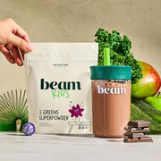 beam Kids All-in-One Superpowder package with a cup and snacks on a light background