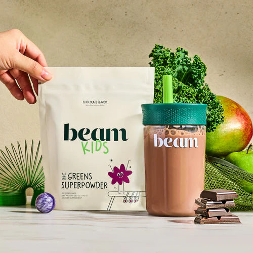 beam Kids All-in-One Superpowder package with a cup and snacks on a light background