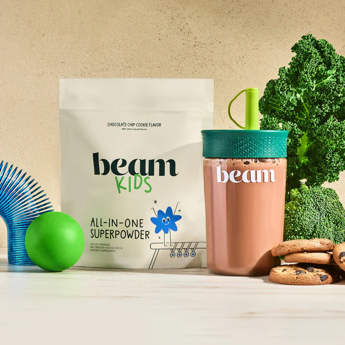 beam Kids All-in-One Superpowder package with a cup and snacks on a light background