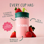 Pink 'beam' cup with strawberries on a pink background