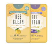 Two packages of Bee Clean beeswax hand sanitizer on a white background