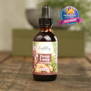 Bottle of Earthley Deep Lung supplement with a dropper on a wooden surface, featuring the Parents' Picks Award badge.