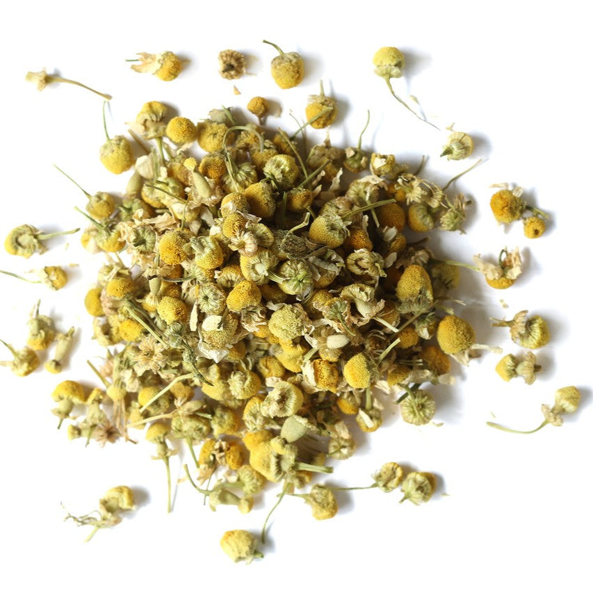 Rise Apothecary Dried chamomile flowers on a white background