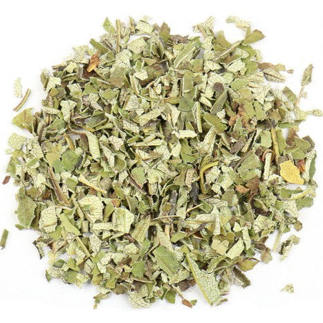 Dried yerba mate herbs on a white background