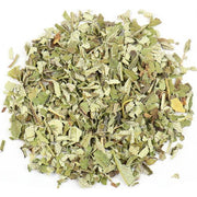 Dried yerba mate herbs on a white background