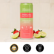 Can of strawberry limeade sparkling electrolytes with strawberries and lime slices on a light background