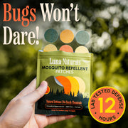 Luna Naturals mosquito repellent patches held by a hand with outdoor background