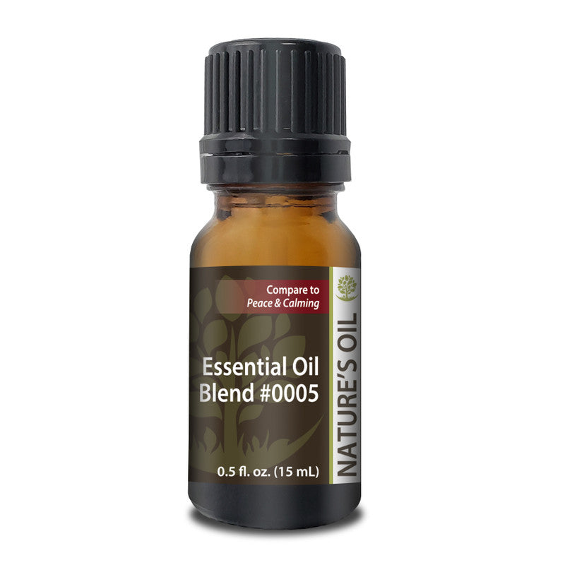 Bottle of Nature's Oil Essential Oil Blend #0005 on a white background