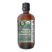 Bottle of Organic Patchouli Essential Oil with label on a white background