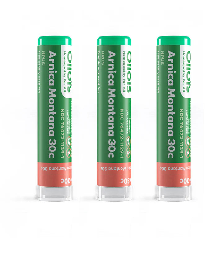 Three green and red bottles of Arnica Montana 30c on a white background