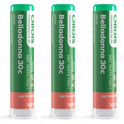 Three green and red tubes of Belladonna 30c on a white background