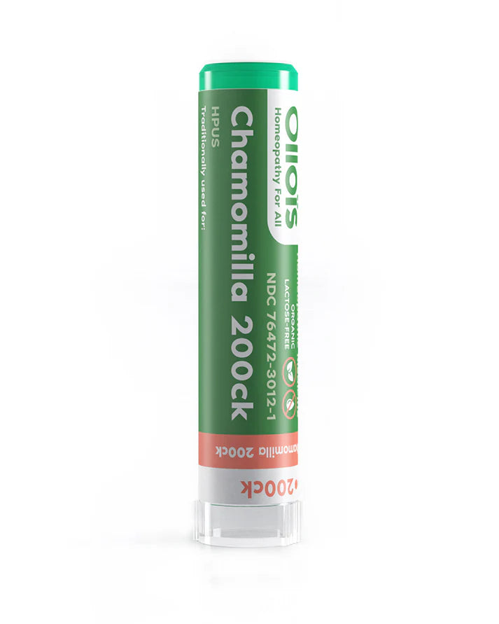 Green and white cylindrical container labeled 'Chamomilla 200ck' on a white background