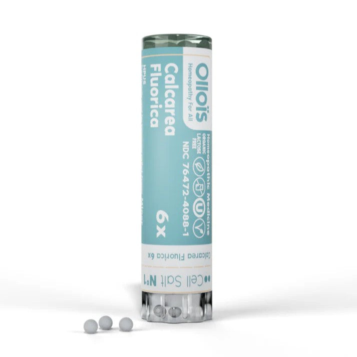 Oliois Calcarea Fluorica supplement container on a white background