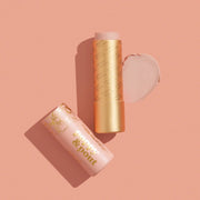 Two cosmetic sticks with 'Poppy & Pout' branding on a pink background