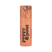 Cosmetic container with 'Poppy & Pout' branding on a white background