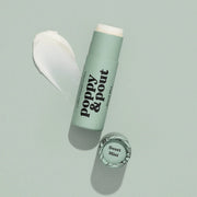 Mint green lip balm with 'Poppy & Pout' branding on a light gray background