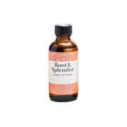 Bottle of 'Root & Splendor' laundry detergent on a white background