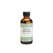 Bottle of Root & Splendor laundry detergent on a white background