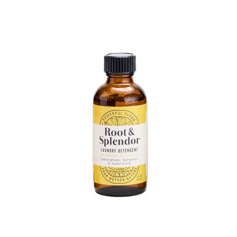 Bottle of Root & Splendor laundry detergent on a white background